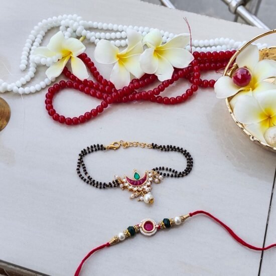 Traditional Rakhi Set with Black Beads and Decorative Pendant