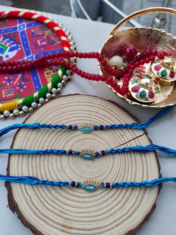 Auspicious Evil Eye Thread Rakhi for Bhai - Blue & Gold Protection Charm - Image 3