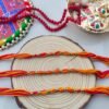 Vibrant Red & Yellow Thread Rakhi with Golden Beads - Classic Bhai Rakhi Set