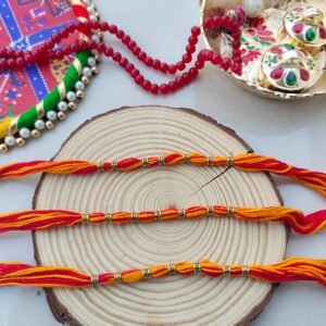 Vibrant Red & Yellow Thread Rakhi with Golden Beads - Classic Bhai Rakhi Set