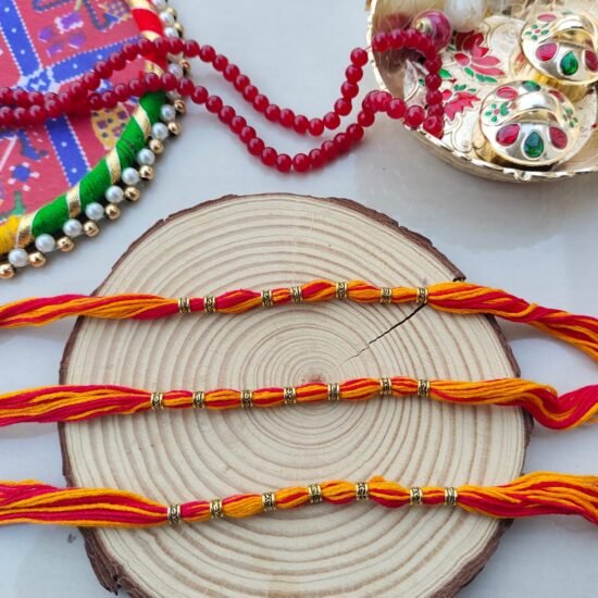 Vibrant Red & Yellow Thread Rakhi with Golden Beads - Classic Bhai Rakhi Set