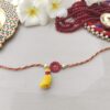 Elegant Pink Flower & Tassel Rakhi - Image 2