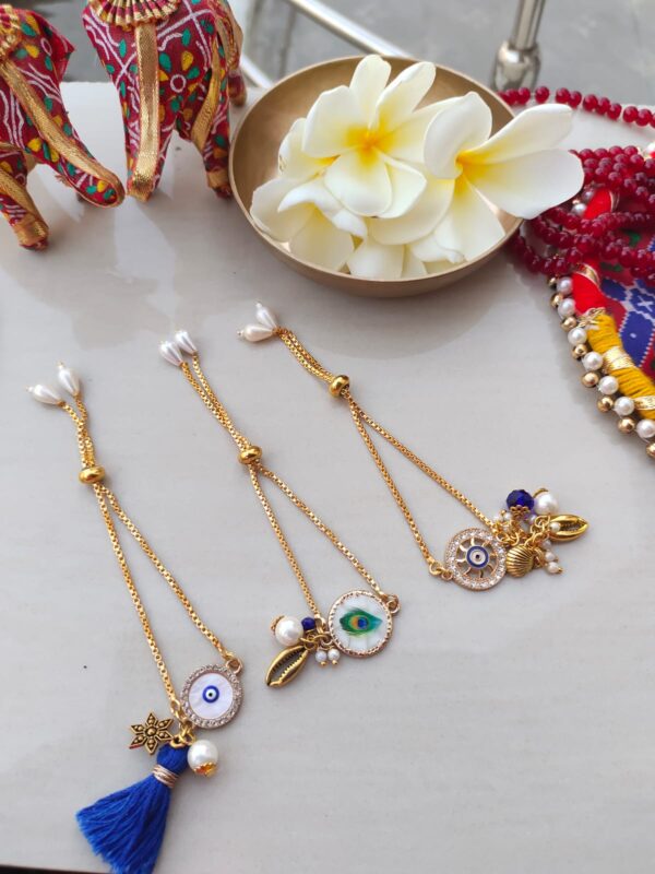 Elegant Evil Eye & Peacock Charm Adjustable Rakhi for Bhabhi & Sister (1Pcs)