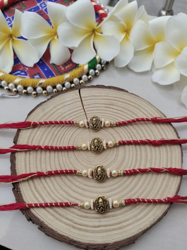 Divine Ganesha Pearl Rakhi Set (1Pcs)