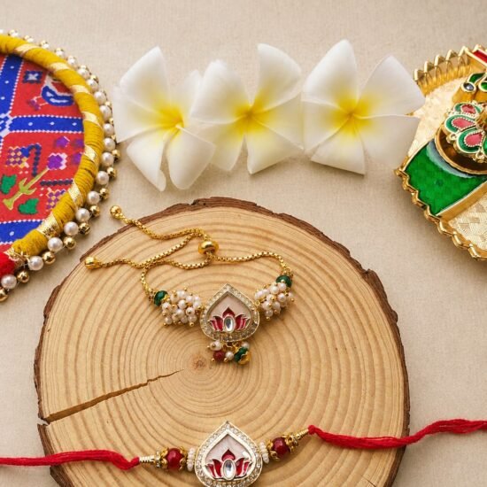 Elegant Kundan Lotus Bhaiya Bhabhi Rakhi & Adjustable Slider Lumba Combo Set