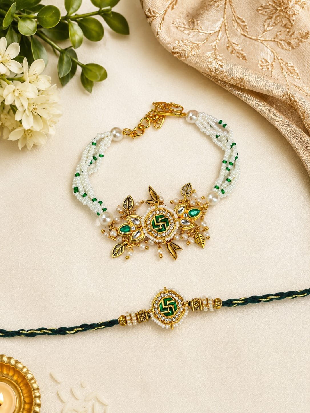 Regal Swastik & Emerald Bhaiya Bhabhi Rakhi & Multi-Strand Lumba Set