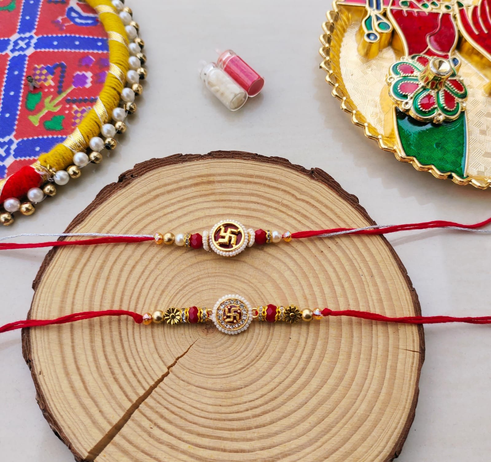 Sacred Swastika & Pearl Designer Rakhi Collection (Single Piece at ₹85 Each)