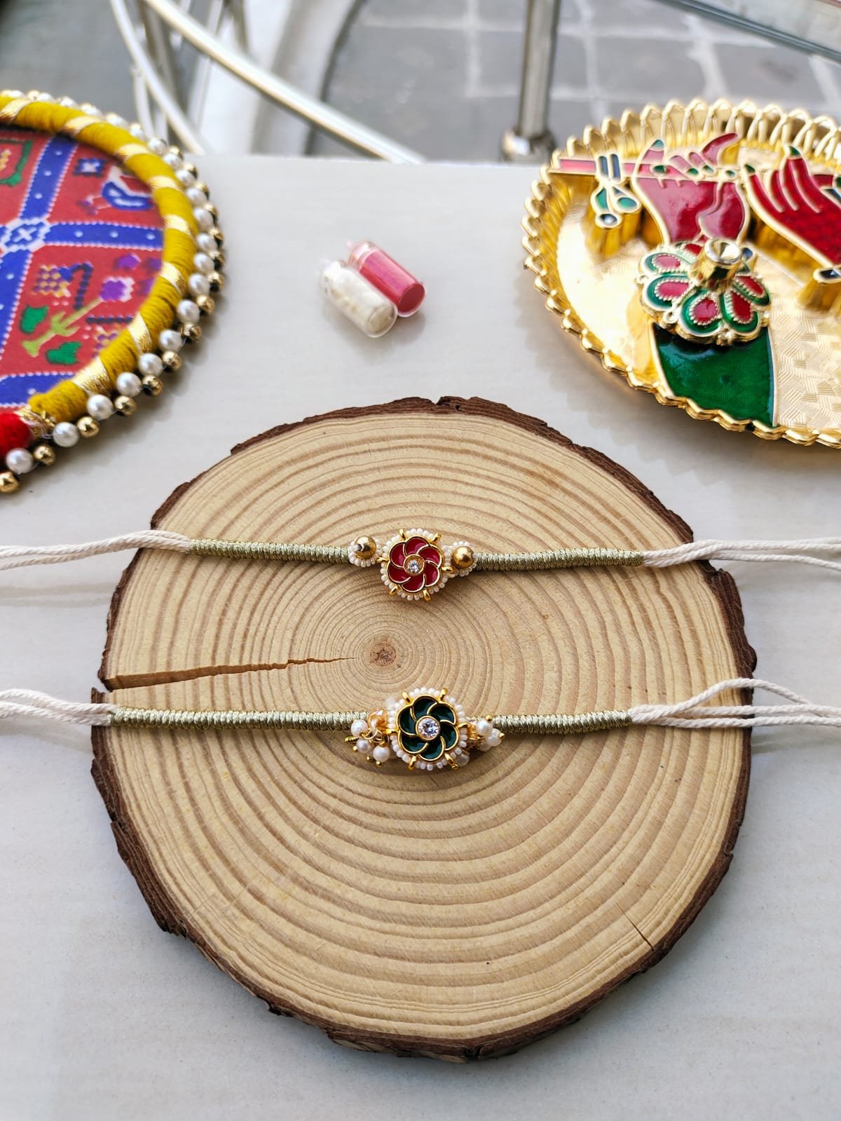 Floral Meenakari & Pearl Designer Rakhi Collection - Image 3