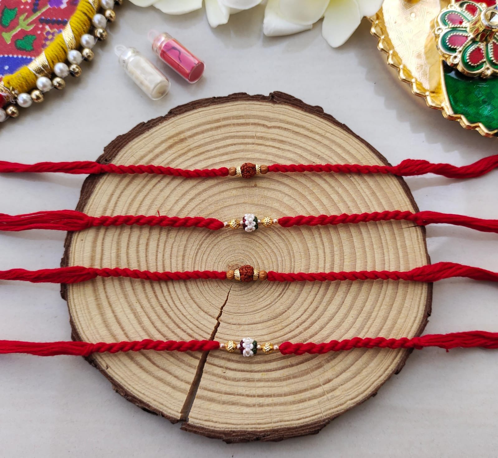 Sacred Rudraksha & Pearl Cluster Designer Rakhi Collection (₹60 Each)