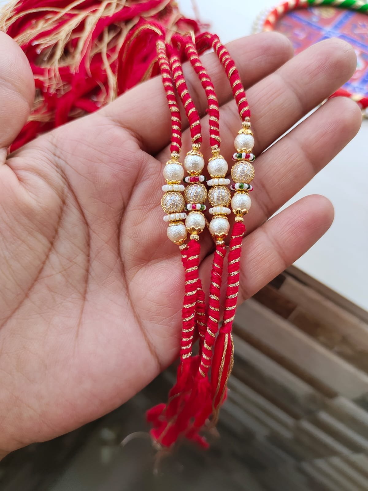 Elegant Pearl & Textured Metallic Bead Designer Rakhi Collection - Image 2