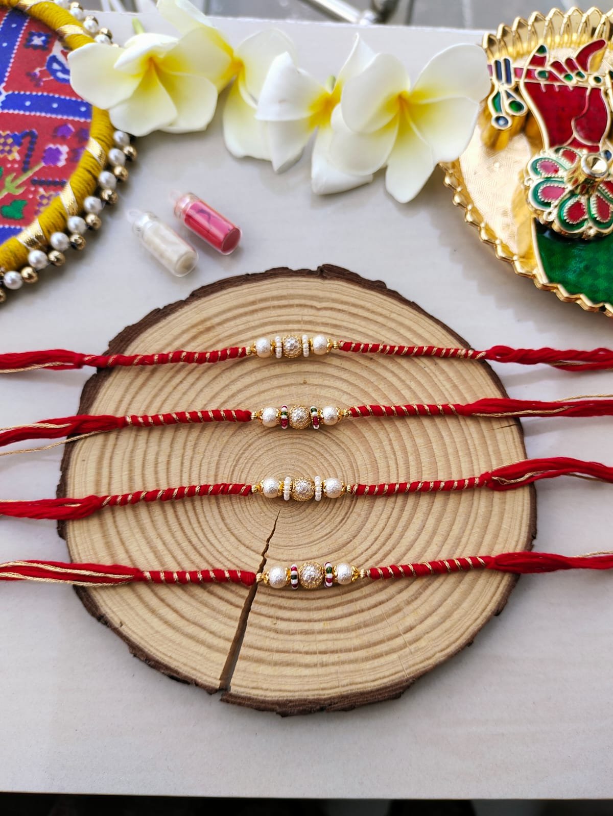 Elegant Pearl & Textured Metallic Bead Designer Rakhi Collection