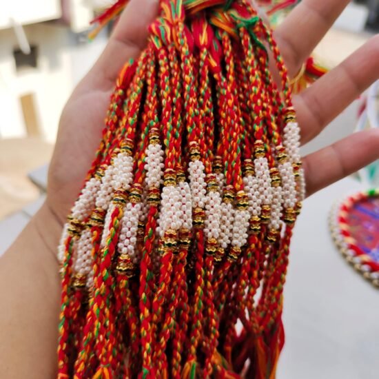 Handcrafted Cylindrical Pearl Cluster Designer Rakhi Collection