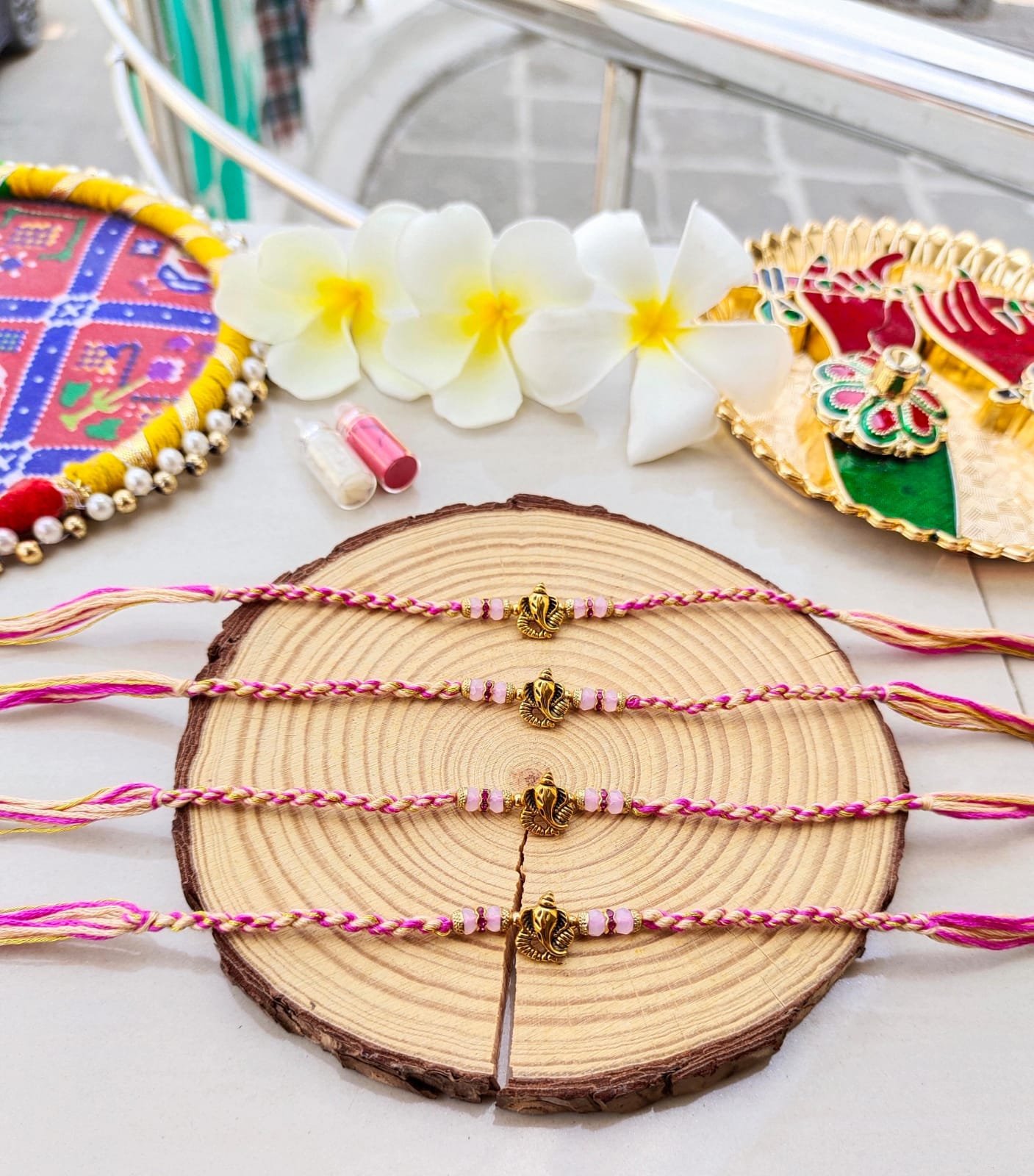 Auspicious Lord Ganesha Designer Rakhi Collection – Choose from Elegant Pink Bead Variants -₹55 per piece - Image 3
