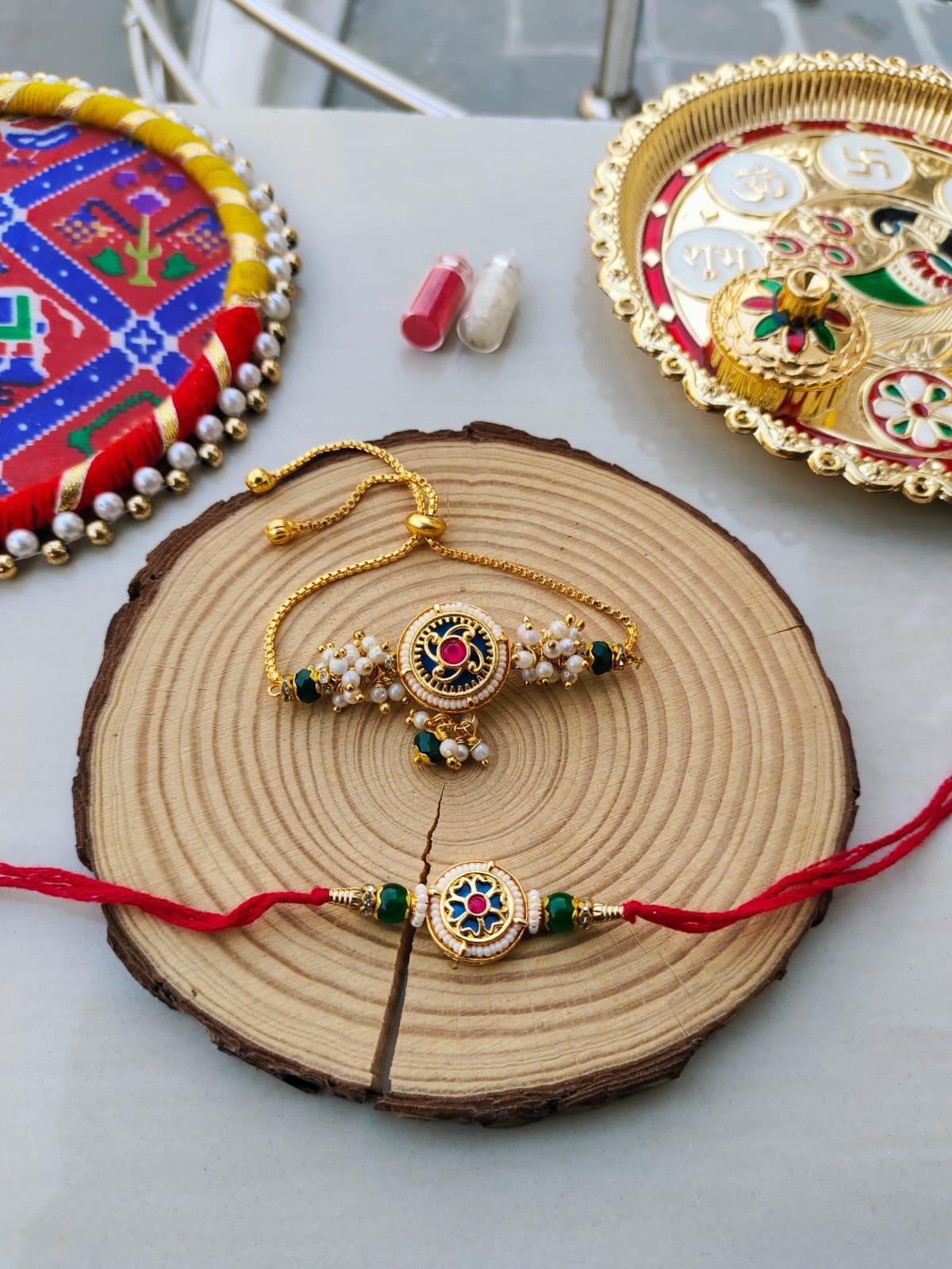 Royal Blue Meenakari Floral Bhaiya Bhabhi Rakhi Combo Set