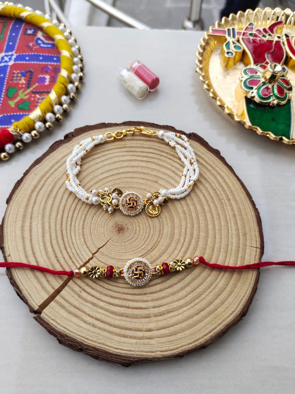 Sacred Swastika & Multi-Strand Pearl Bhaiya Bhabhi Rakhi Combo Set