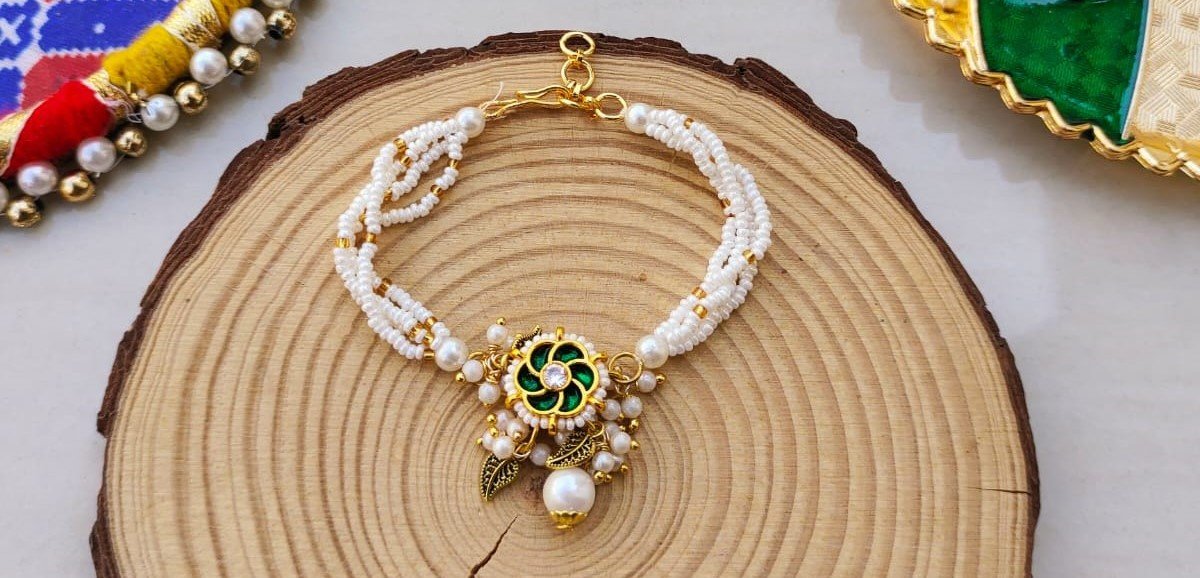 Green Floral Meenakari & Multi-Strand Pearl Bhaiya Bhabhi Rakhi Combo Set - Image 3