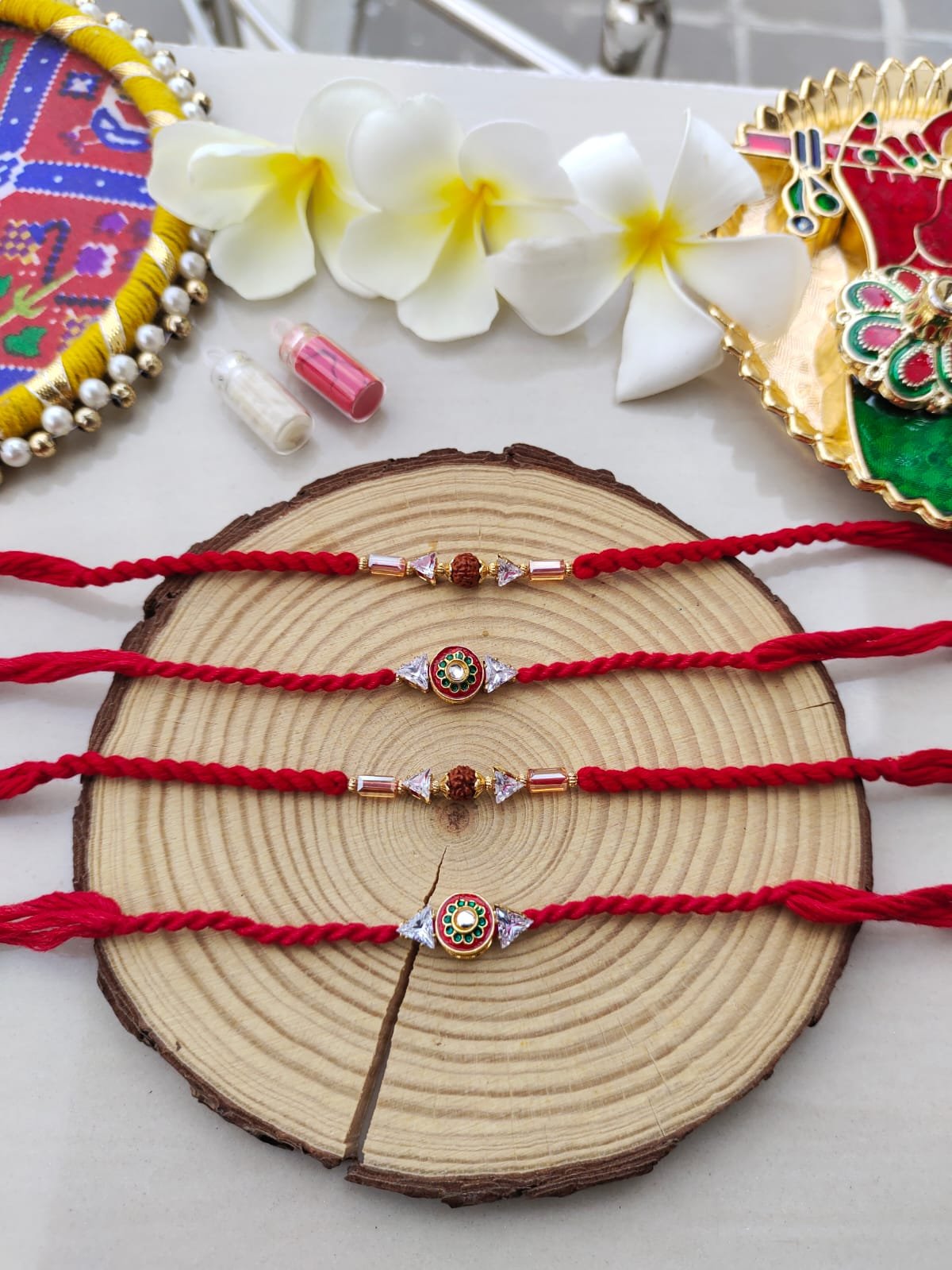 Sacred Rudraksha & Floral Meenakari Couple Rakhi Set