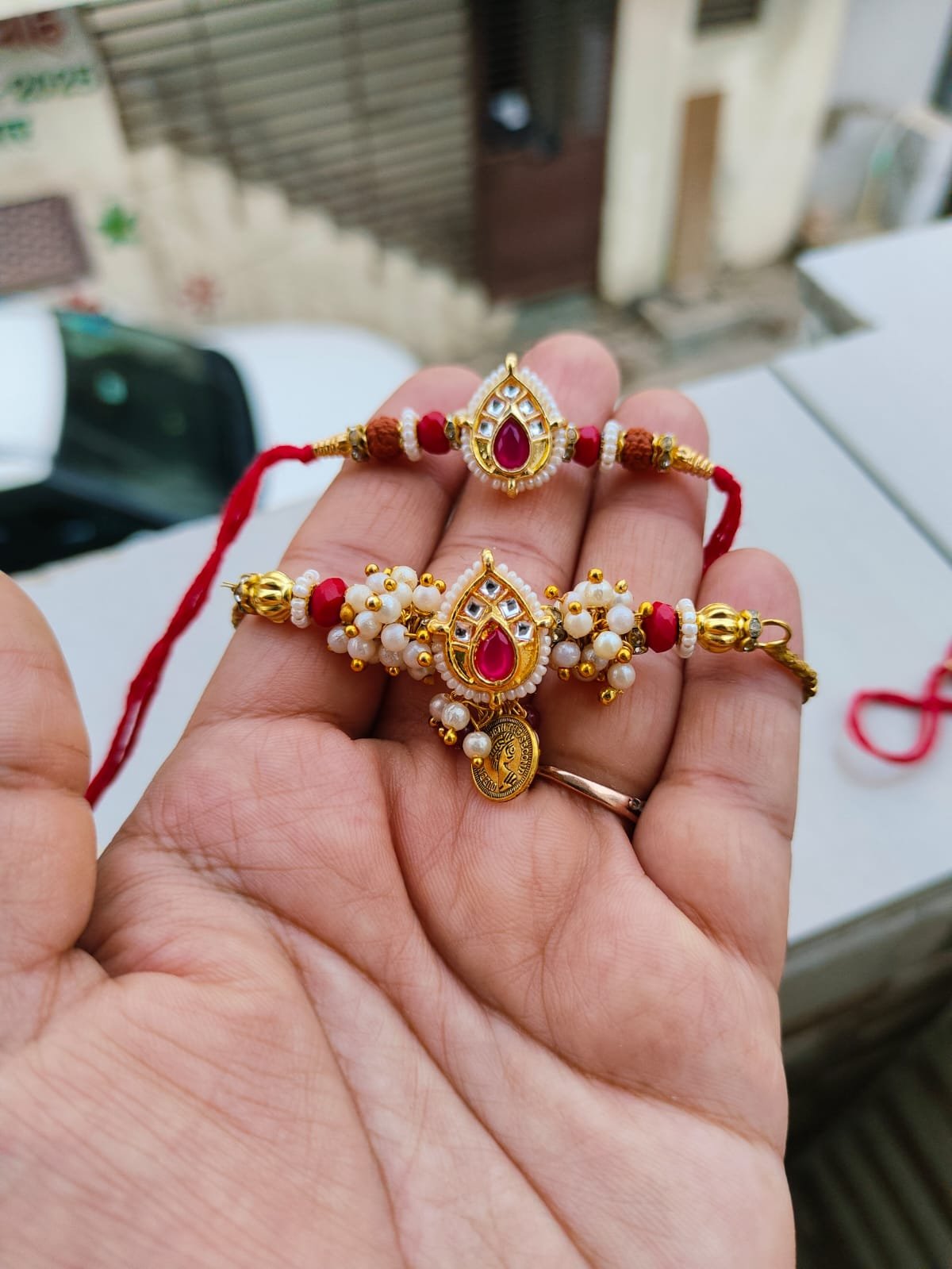 Royal Pink Kundan Laxmi Coin Bhaiya Bhabhi Combo Rakhi Set - Image 2