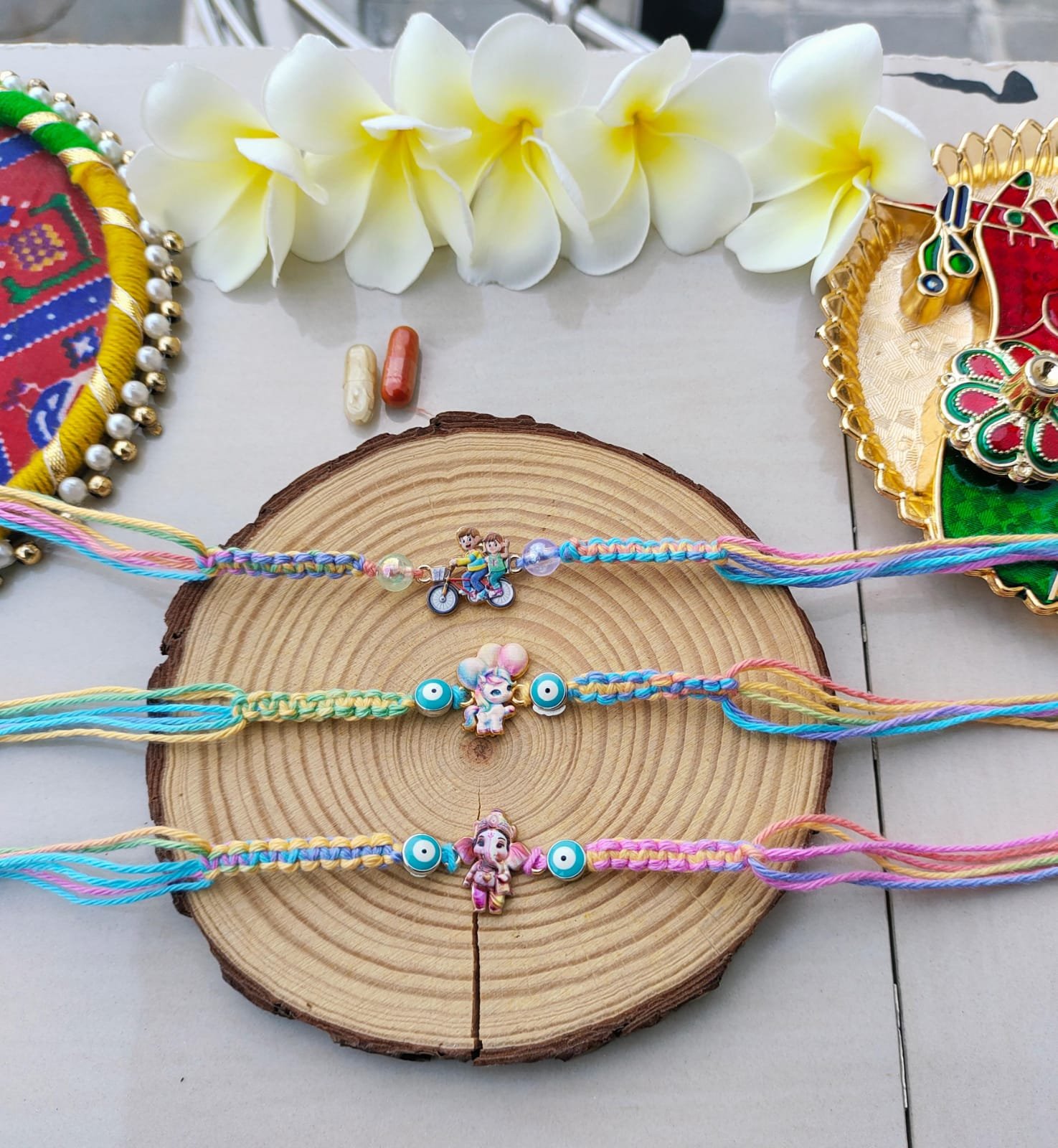 Cycling Siblings Playful Pastel Kids Rakhi (Single Piece)