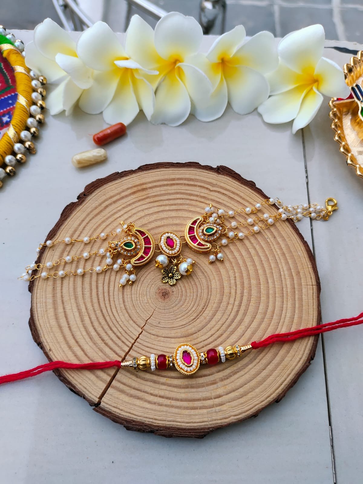 Royal Pink Chand Kundan Multi-Strand Pearl Bhaiya Bhabhi Combo Rakhi Set - Image 2