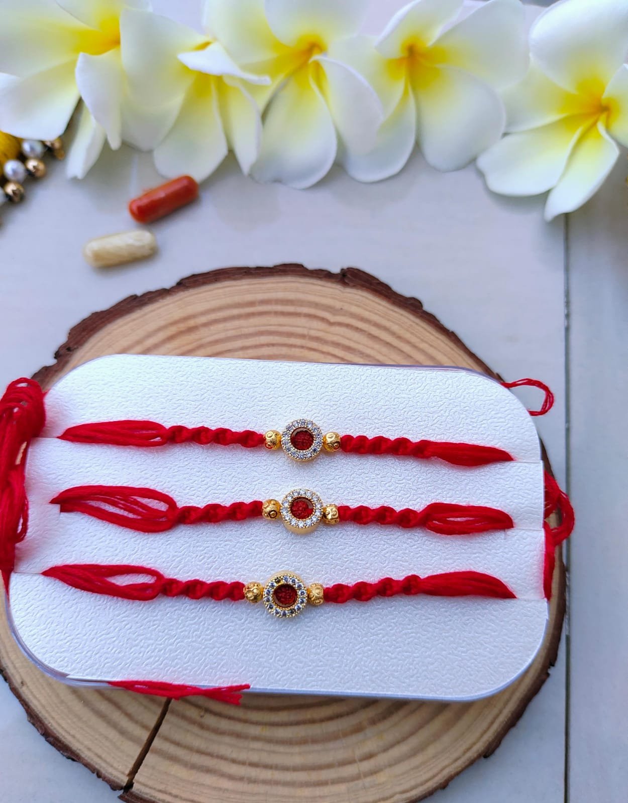 Traditional Ruby Red Diamond Style Circular Dial Designer Rakhi (Single Piece)