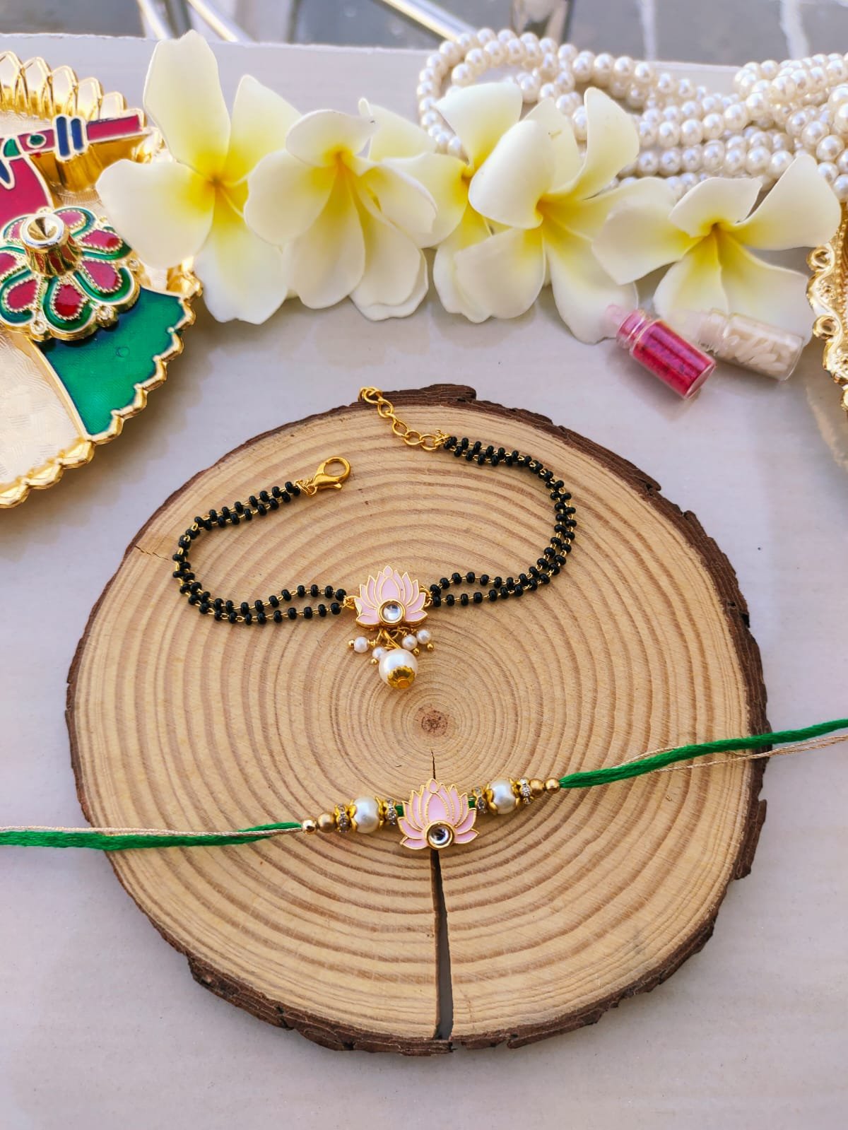 Pink Lotus Mangalsutra Style Bhaiya Bhabhi Combo Rakhi Set