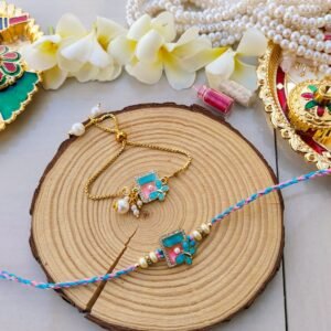 Pastel Butterfly Geometric Dial Bhaiya Bhabhi Combo Rakhi Set