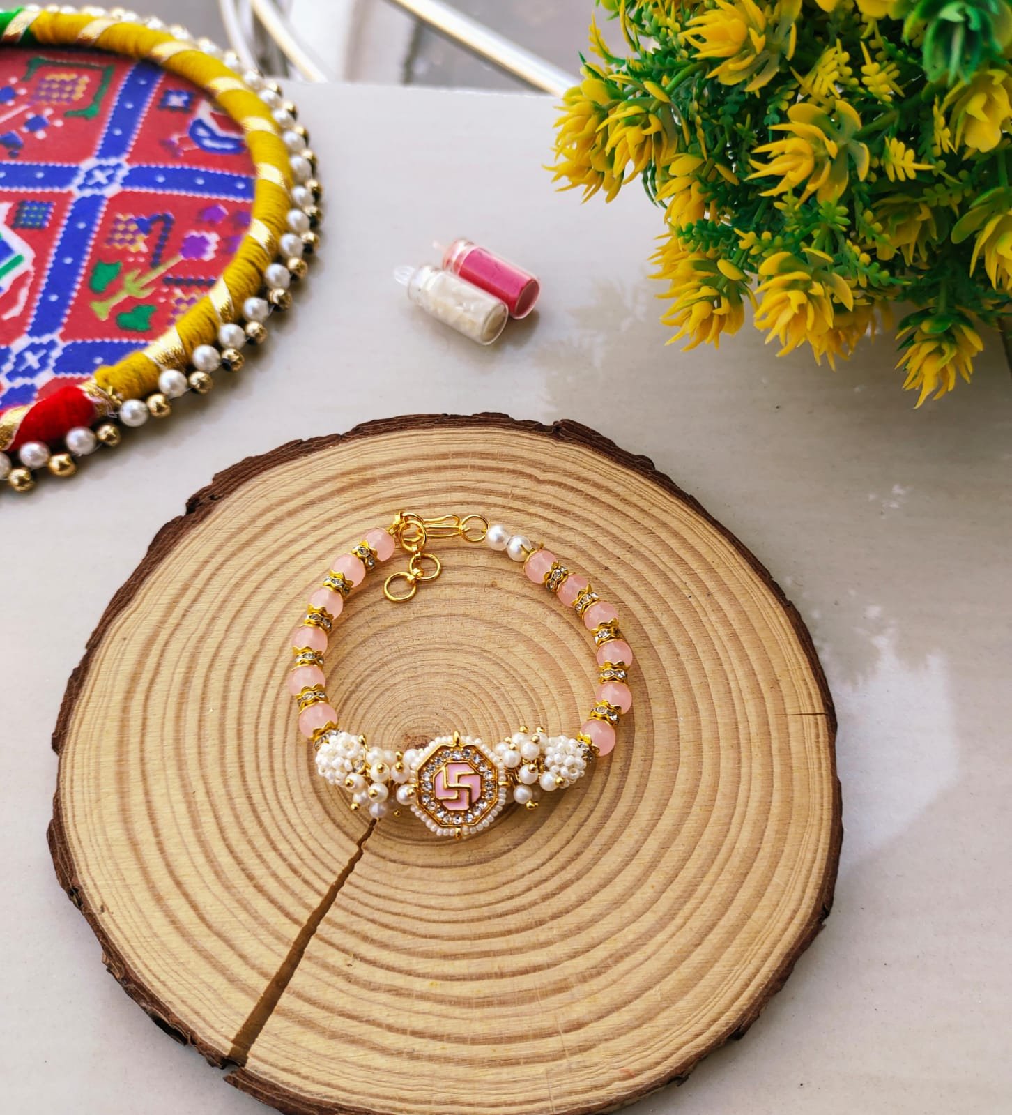 Pastel Pink Swastik Beaded Lumba Bracelet Rakhi for Bhabhi - Image 4