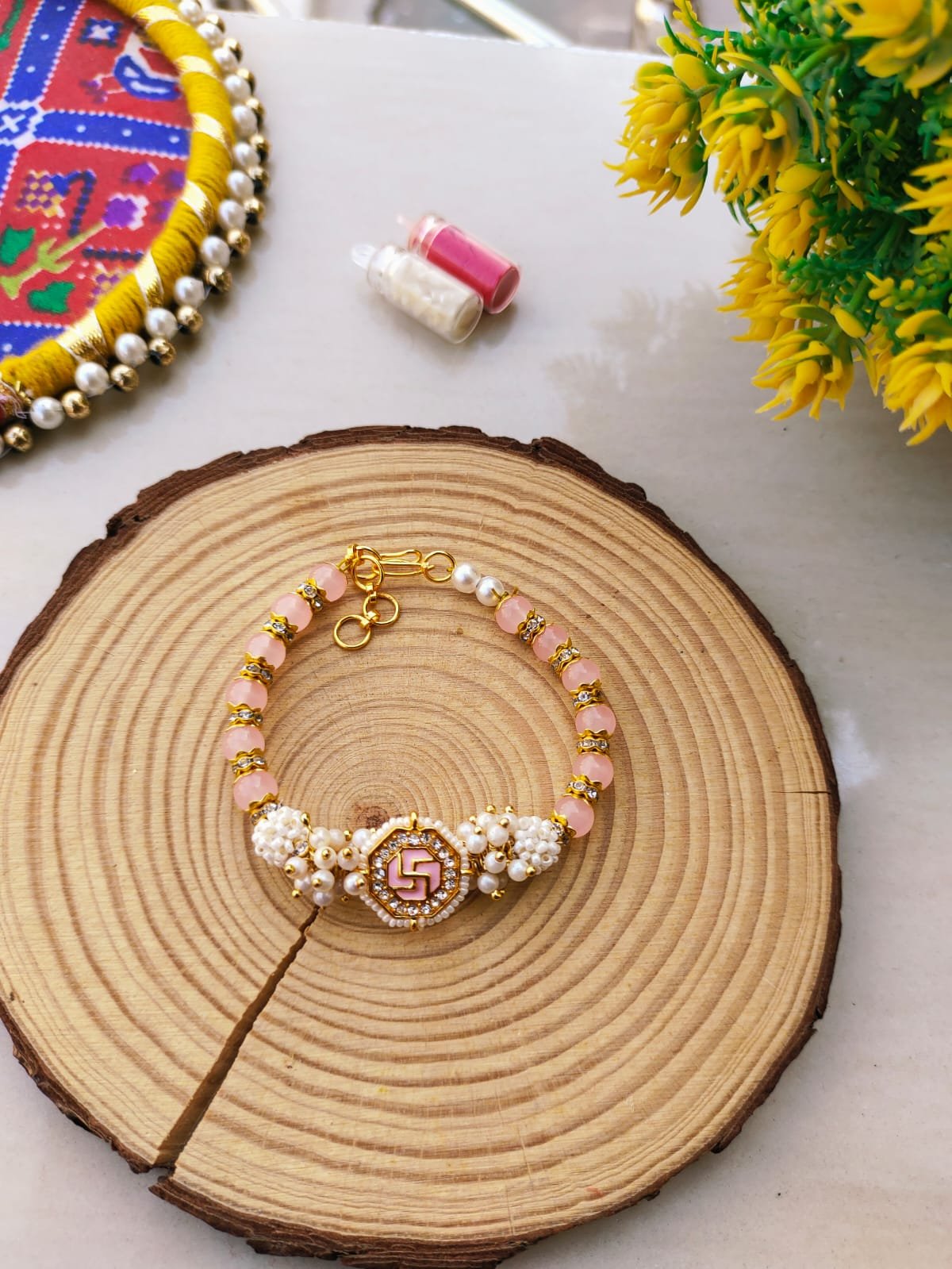 Pastel Pink Swastik Beaded Lumba Bracelet Rakhi for Bhabhi - Image 3