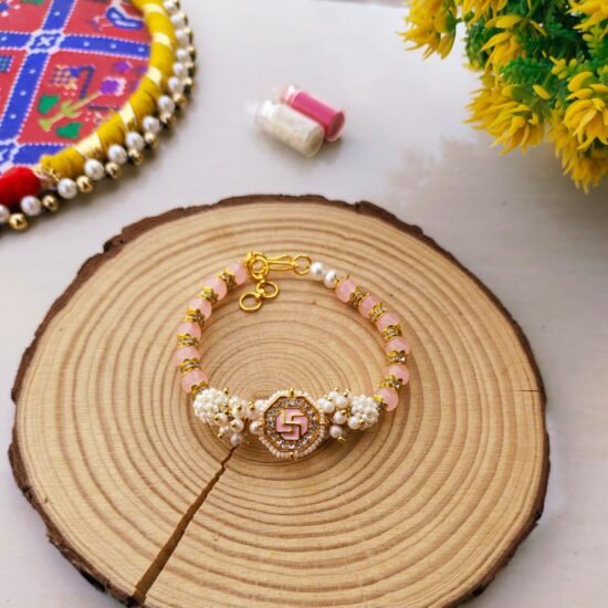 Pastel Pink Swastik Beaded Lumba Bracelet Rakhi for Bhabhi