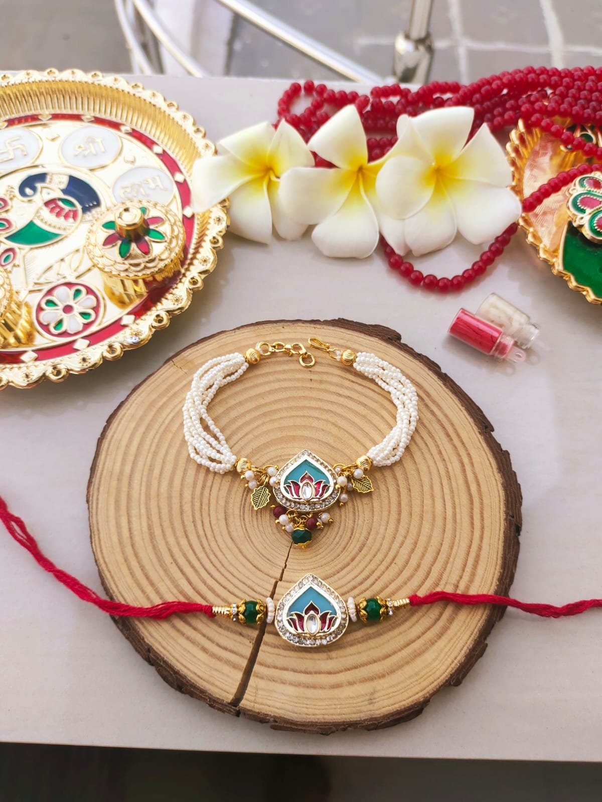 Royal Sky Blue Meenakari Lotus Multi-Strand Pearl Bhaiya Bhabhi Combo Rakhi Set - Image 3