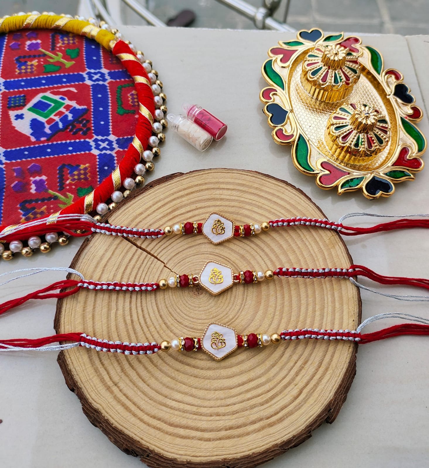 Divine White Enamel Rhombus Lord Ganesha Designer Rakhi Collection