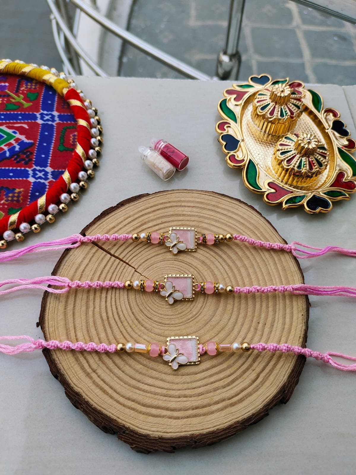 Elegant Pastel Pink Butterfly Enamel Designer Rakhi Collection