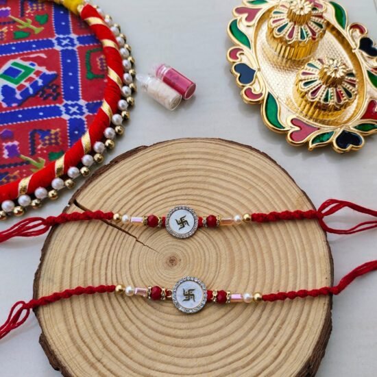 Auspicious White Enamel Swastik Designer Rakhi Collection